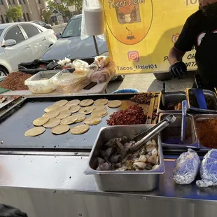 a woman preparing tacoss
