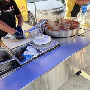 a man preparing food on a table