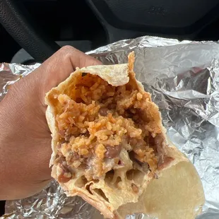 This is supposed to be a "super" burrito. Mostly rice and beans. Very little meat. Rip off