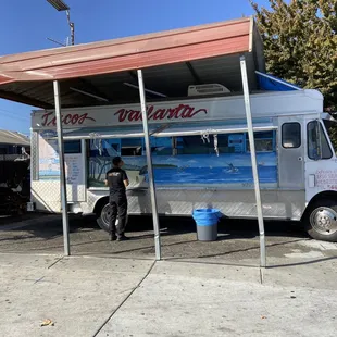 a food truck parked in a parking lot