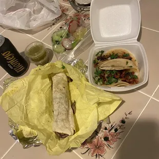 Tacos of carne arabe ($4 each) and pastor ($2 each). Included for free are two salsas, cucumbers, limes, and scarlet turnips.