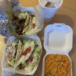 3 steak tacos, 3 ground beef tacos, an order of rice, and an horchata(no ice).