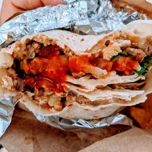 Carne asada, potato, eggs, onions, cilantro, salsa