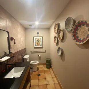 a bathroom with a toilet and sink