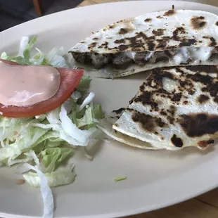 QuesaTaco de carne asada (a quesadilla made with corn tortillas instead of flour)