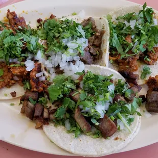 4 tacos. Asada, pastor, carnitas and chorizo.