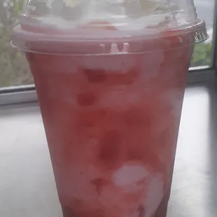 a drink in a plastic cup