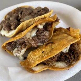 Beef tongue vampiro, beef head quesataco, shredded beef quesataco