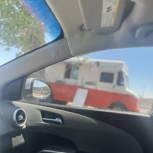 Food truck is located in a rear parking lot area, address is precise on google.