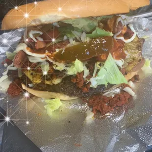 Tortazo(milanesa chorizo Pastor piña jamón y salchicha)