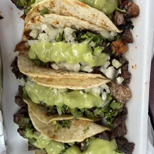 Tacos de asada y al pastor. Great flavor. Self service toppings.