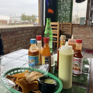 a table full of condiments