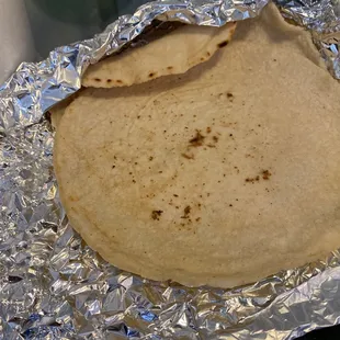 a tortilla wrapped in foil