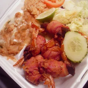 Camarones Costa Azul.  Shrimp and seafood w/cheese wrapped in bacon.  Very very guilty pleasure.