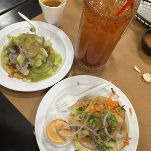 Aguachiles, fish taco, michelada