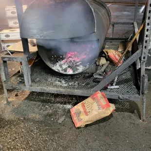 smoke coming out of a grill