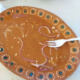 a plate with a fork and knife