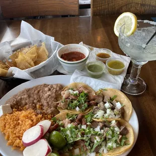 2 Tripa, 2 Lengua plate, complete with 3 extra salsas and house margarita.