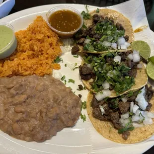 3 asada taco with rice and beans