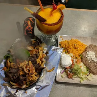 Fajitas (chicken, beef, &amp; shrimp) with mango margarita