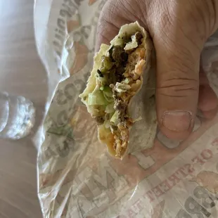 What's left of a very large steak burrito