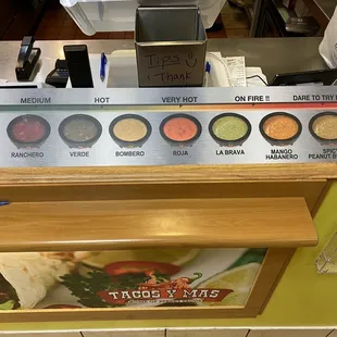 Their selection of sauces - most mild on the left and progressively getting hotter as you move to the right.