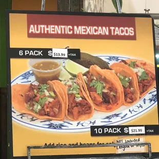 a sign for authentic mexican tacoss