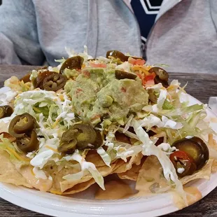 Cheese nachos how mom wanted hers &amp; the cheese is real runny! They added water to make it stretch. Salsa taste great!