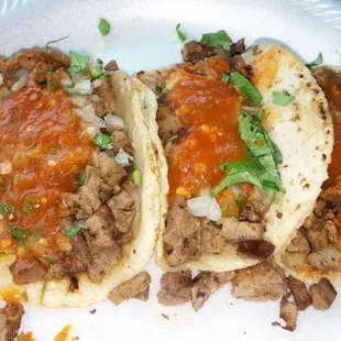 This is what tacos de asada look like. The most flavorful tacos in Santa Fe. Its right by the car wash on Siler st.