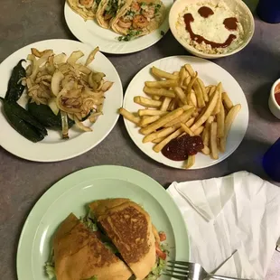 Shrimp tacos, elote, torts and fries