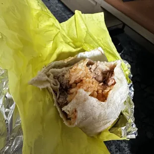 a burrito wrapped in foil
