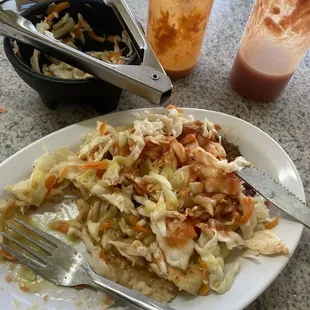 A pupusa with three different sauces