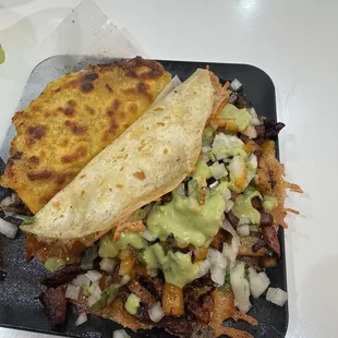 Birria taco and  al pastor quesadilla