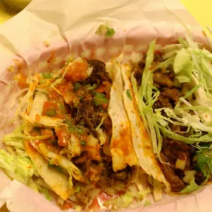 You can only see the carnitas (left) and asada (right) tacos here