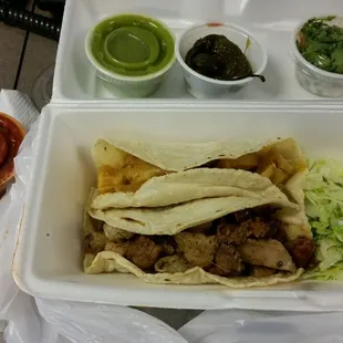 Chicharron and tripas tacos and sauces