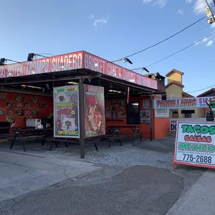 Our patio area. Picnic Tables and big screen tv