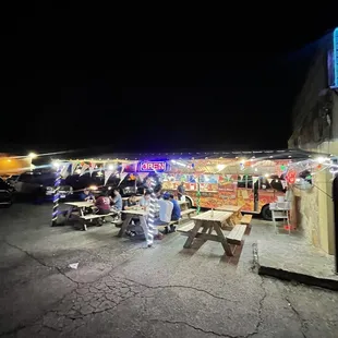 a taco stand at night
