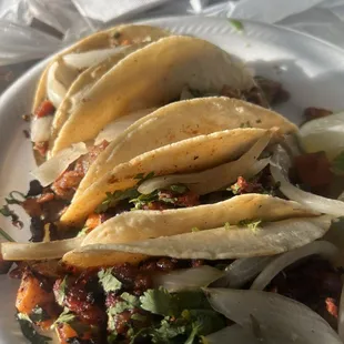 top: tripas tacos, bottom: al pastor