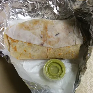 Beef burrito with jalapeño sauce