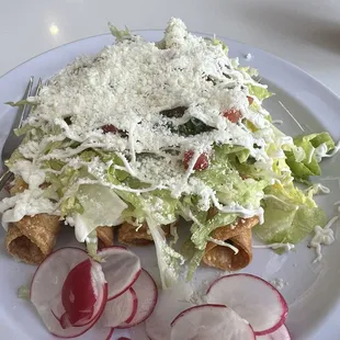 Four flautas a la carte, very good. I preferred the beef, chicken was a little too salty