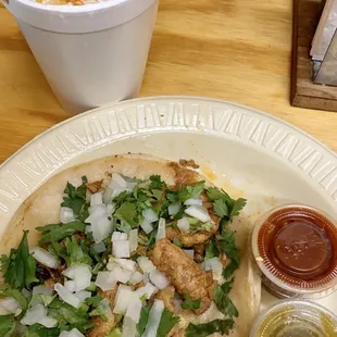 Chicken taquito, corn in a cup