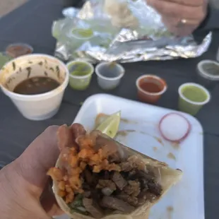 Tacoqyesa and carne asada burrito. Great flavors.