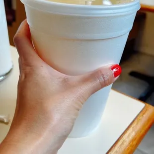 Pineapple agua fresca (I didn&apos;t expect the drink to be so big, see how far my fingers are stretching?!)