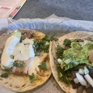 yummy chicken tinga and carnitas tacos  before adding special fresca suggested by Logan