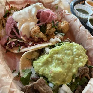 Cauliflower taco and carne asada taco