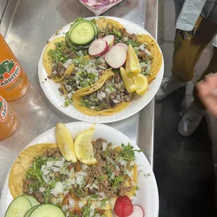 Tacos, jarritos, pickled onions