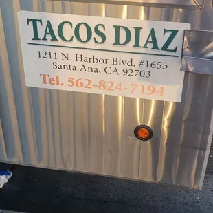 a taco truck parked on the side of the road