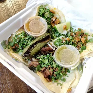 Chicken, Marinated Pork, and Steak tacos