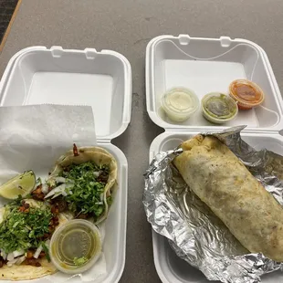 On the left is a pastor taco and carnitas taco, and on the right is an Asada burro.