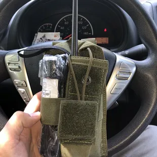 North American Rescue CAT Tourniquet, and radio pouch.